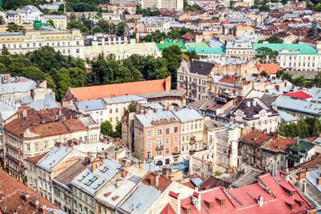 aerial view of central part of old european city Lvov with age-old ruins and city roofsの写真素材