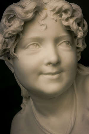 Crimea Vorontsov palace macro view old-aged little girl light white marble sculpture near tree in green gardenのeditorial素材