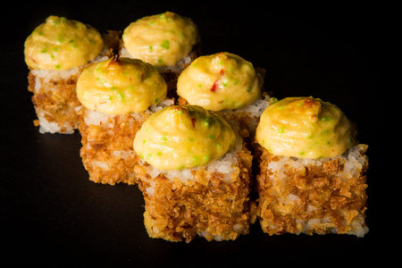 baked roll with smoked chicken, tobiko caviar, philadelphia cream cheese decorated with kranch-onion...