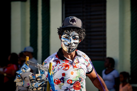 Concepcion De La Vega, DOMINICAN REPUBLIC - FEBRUARY 09, 2020: closeup man in silver vendetta mask...