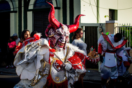 Concepcion De La Vega, DOMINICAN REPUBLIC - FEBRUARY 09, 2020: closeup man in red devil mask and...