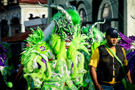 Concepcion De La Vega, DOMINICAN REPUBLIC - FEBRUARY 09, 2020: native people in green masquerade...