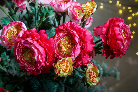 top view closeup elegant bouquet made from large artificial red peonies