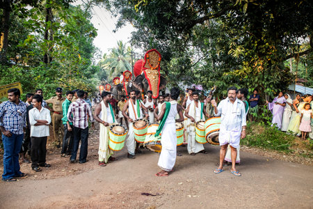 Kottayam, Kerala, INDIA - JANUARY 25, 2012: many indian drummers play national drums walking by...