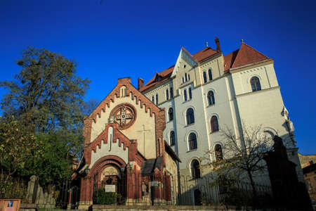 panoramic view on oldest catholic church of St. John the Baptist against clear blue sky in city Lviv, Ukraineの写真素材