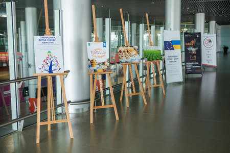 LVIV, UKRAINE - MAY 24, 2018: empty Lviv international airport hall with local food photo exhibition on May 24 in Lvivのeditorial素材