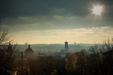 top view from hight castle on city hall, main cathedral, and old houses roofs in historical district of Lviv city, Ukraineの写真素材