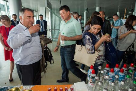 LVIV, UKRAINE - MAY 24, 2018: many passengers take part in free alcohol degustation in Lviv international airport on May 24 in Lvivのeditorial素材