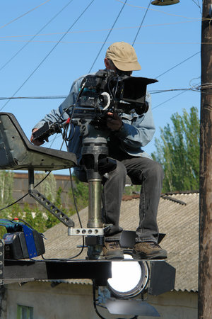  A cameraman sitting on the gibbet