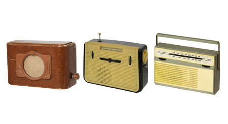 Three old fashioned radio-sets over white 