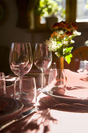 plates and wine glasses on the table  の写真素材