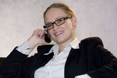 Young woman on phone  の写真素材