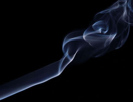 Abstract blue smoke over black  の写真素材