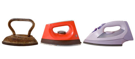 Three different irons over white backgroundの写真素材