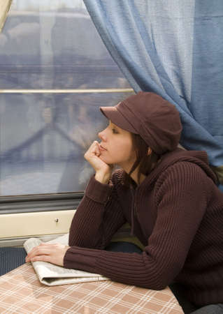 Young woman travel in passenger roomette  の写真素材