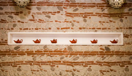 Shelf with decorative teapots  の写真素材