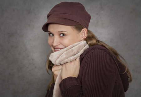 Portrait of attractive blond woman over grey backgroundの写真素材