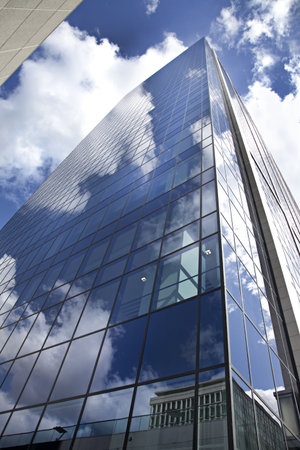 High modern skyscraper on a background of the blue sky