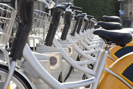 Bicycles parked in a row on a city street