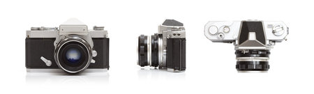 Classic 35mm camera from the 1970's isolated on white