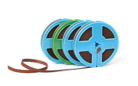 Vintage magnetic audio reels on a white background.の写真素材