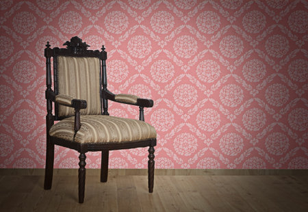 Old Antique armchair from Victorian era Near The Wall