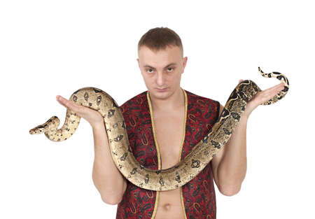 Portrait of Young Caucasian man with boa snakeの写真素材