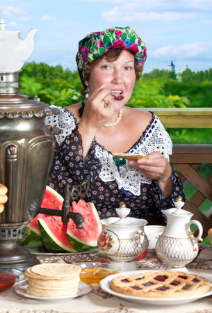 Portrait of Mature Lady drinking tea from Victorian eraの写真素材