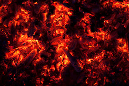 Full frame shot of glowing embers in hot red colorの写真素材