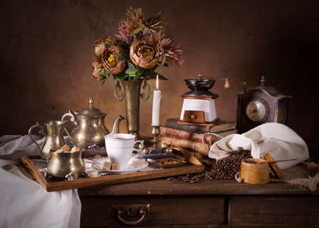 Classical Dutch style with fruit, flowers, candle and tea trayの写真素材