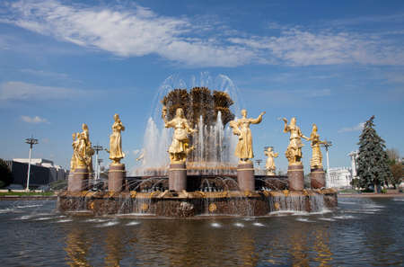 RUSSIA, MOSCOW - September  15, 2015: Exhibition of Achievements of the People's Economy (VDNKh). Famous fountain "Friendship of peoples" on territory of exhibition complex with the figures of girls of different nationalityの写真素材