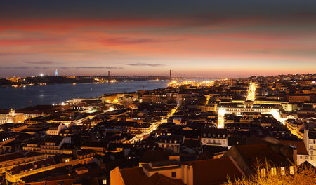 Panoramic view of night Lisbon with Tagus (Tejo) river, Portugal