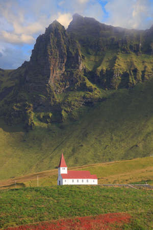 Typical Icelandic church in Vik - charming little town in Southern Icelandの写真素材