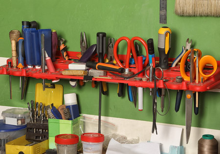 Set of tools on the shelf in the workshop