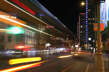 Car traffic on the night streets of Moscow city. The photo was taken at a long exposureの写真素材