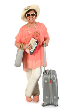 Old woman with tickets, money and suitcase in traveler's clothing isolated on white backgroundの写真素材