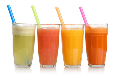 Set of fresh fruits and berries smoothie juice isolated on a white backgroundの写真素材