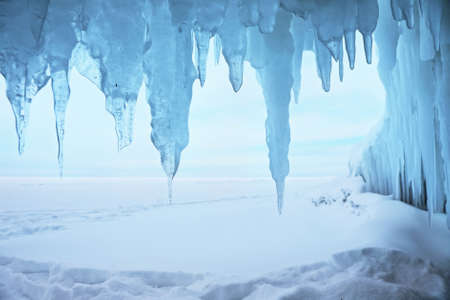 View from frozen grotto to the winter Baikal lake. Siberia, Russiaの写真素材