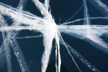 Transparent smooth ice with cracks. Baikal Lake, Russiaの写真素材