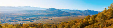 Panoramic view with a beautiful view of the Caucasus mountains on a sunny autumn day. Adygea, Russiaの写真素材