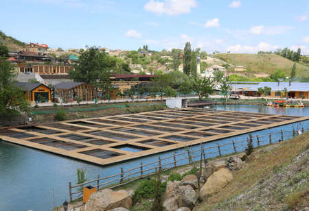 Fish farm for artificial breeding of salmon in Adygea Republic, Russiaの写真素材