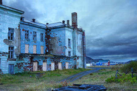 Abandoned house in the village of Teriberka in the harsh northern territory of Russiaの写真素材