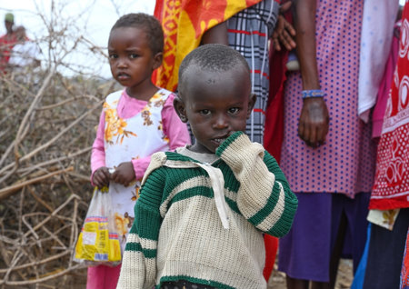 A SUBURB OF NAIROBI, KENYA - NOVEMBER 14, 2022:  African children from Masai tribe, Kenya, Africaのeditorial素材