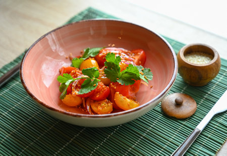Tomato salad with parsley. Diet vegetarian saladの写真素材