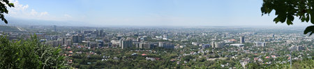 Panoramic view of Almaty city from the top of Kok Tobe Mountain, Kazakhstanの写真素材