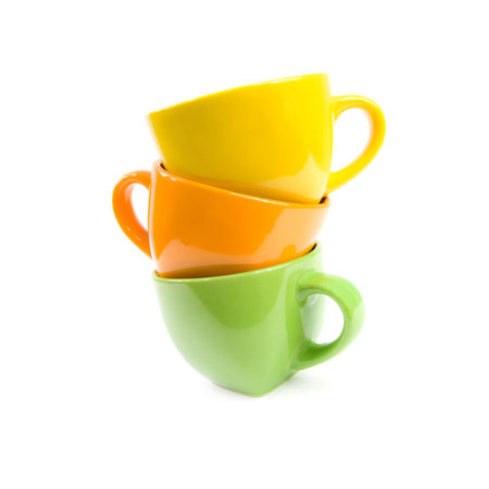 Colored cups. Isolated on white background.の写真素材