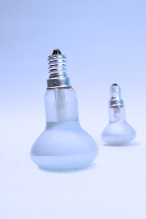 Two light bulbs in the blue light