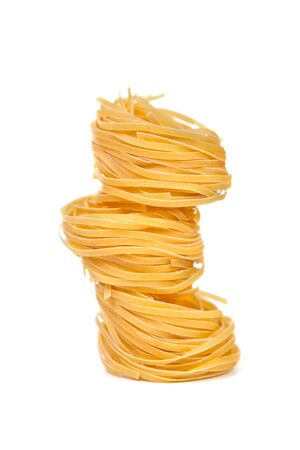 Pasta products "nests". Isolated on white background の写真素材