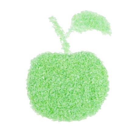 Salt for bathroom a scattered in the shape of an apple isolated on a white backgroundの写真素材
