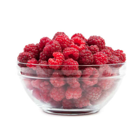 Dish with raspberries. Isolated on white backgroundの写真素材